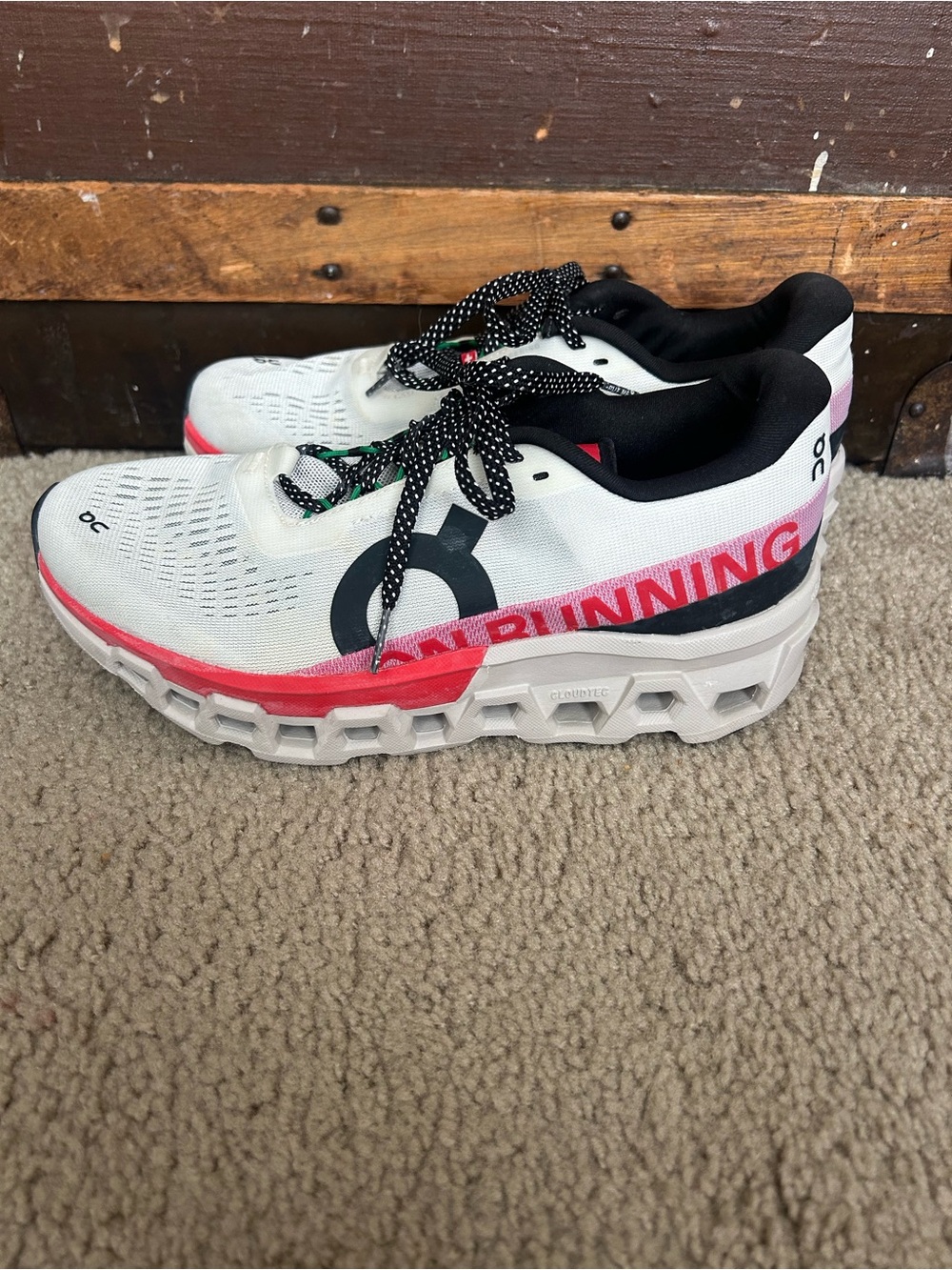 On Running Women’s Cloudmonster White Black Pink Accent Running Shoes